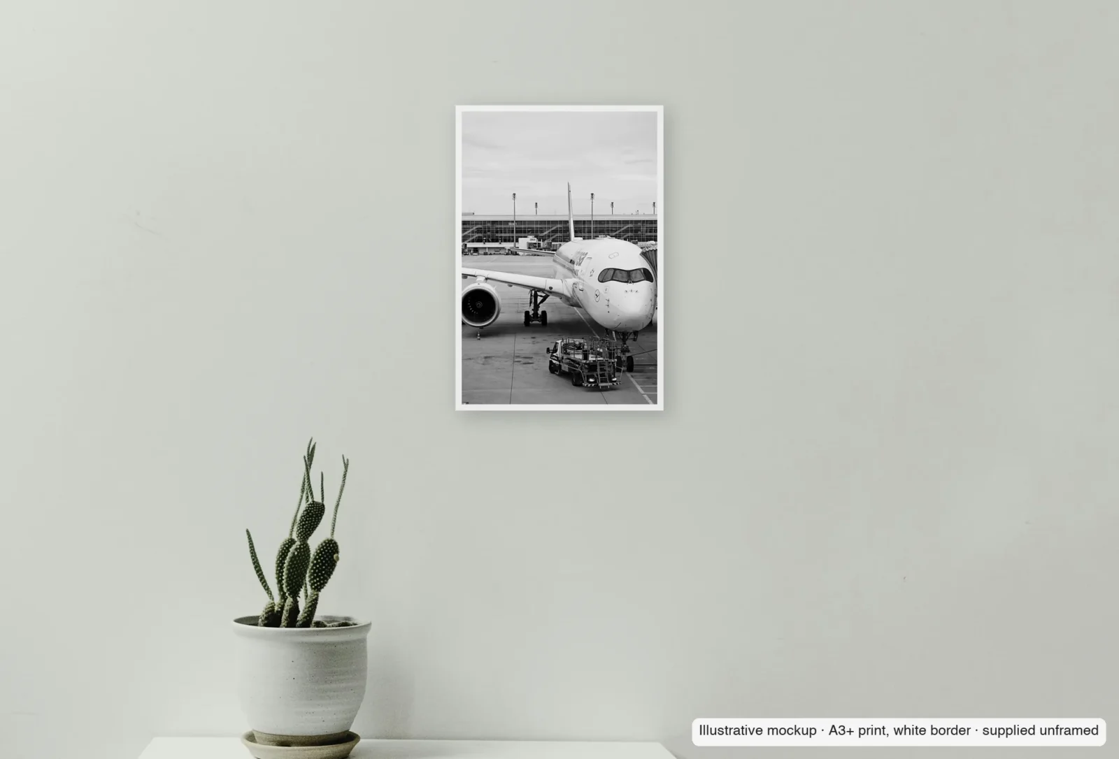 Closer view of A350 at the pier, Munich as an unframed A3+ white-border print above a sideboard.