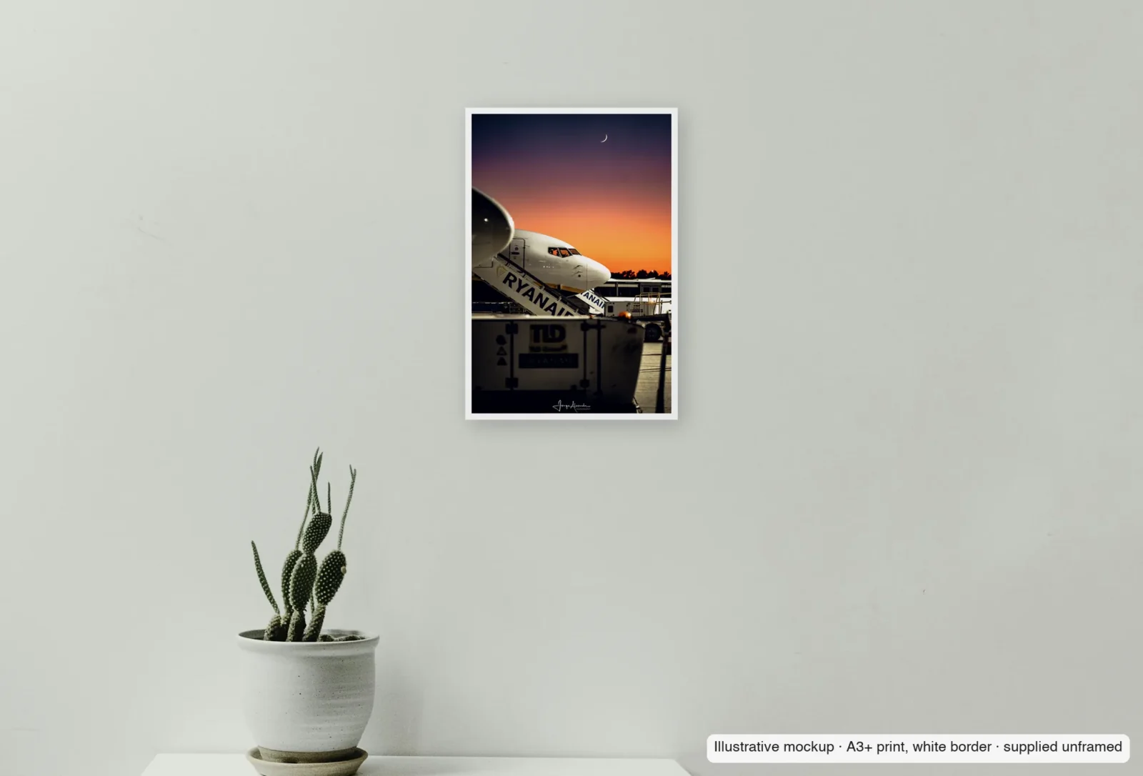 Closer view of Crescent over the stairs as an unframed A3+ white-border print above a sideboard.