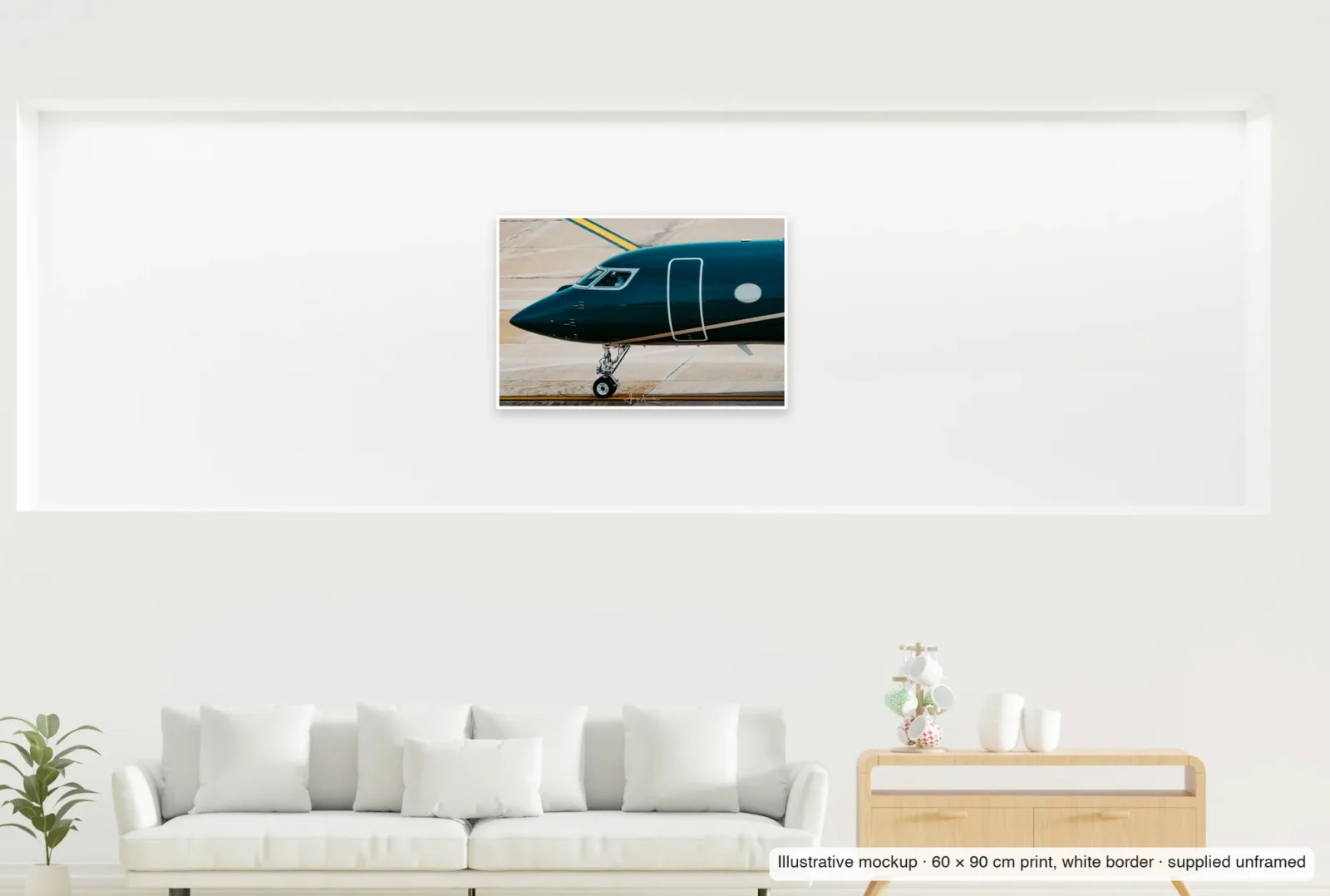 Illustrative mockup showing the scale of Emerald nose as an unframed 60 × 90 cm print above a sofa.