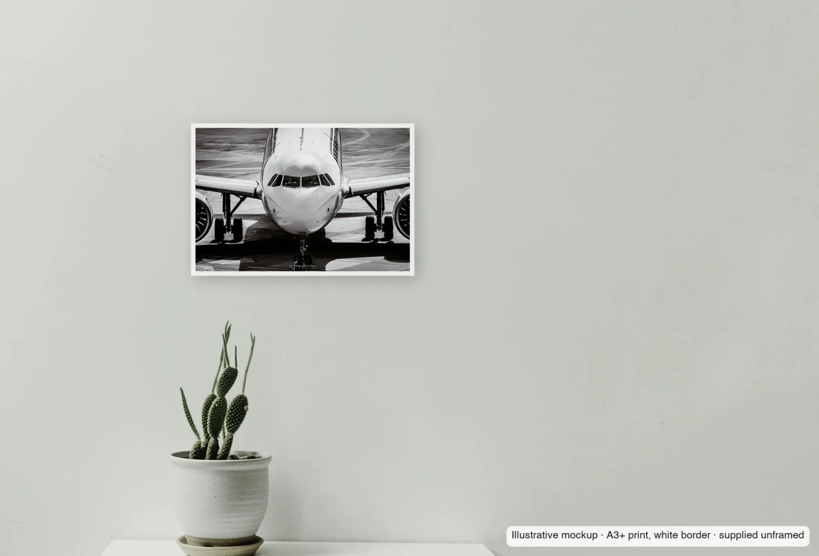 Closer view of Face to face as an unframed A3+ white-border print above a sideboard.