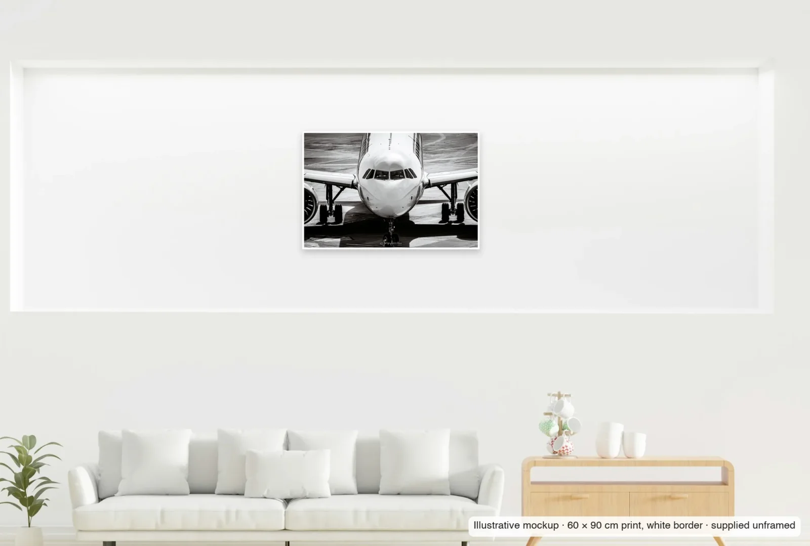 Illustrative mockup showing the scale of Face to face as an unframed 60 × 90 cm print above a sofa.