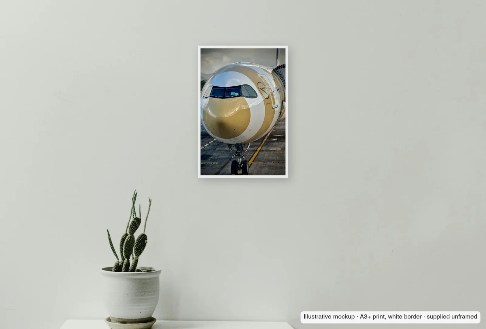 Closer view of Golden crescent as an unframed A3+ white-border print above a sideboard.