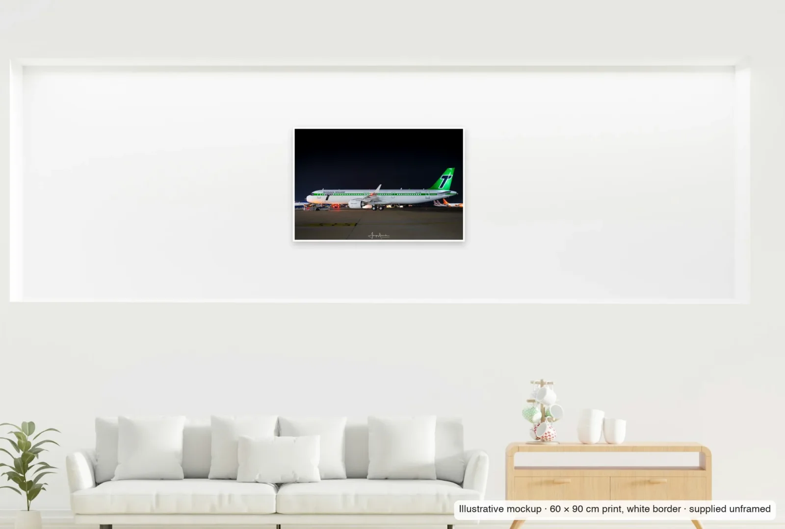 Illustrative mockup showing the scale of Heritage in the blue hour as an unframed 60 × 90 cm print above a sofa.