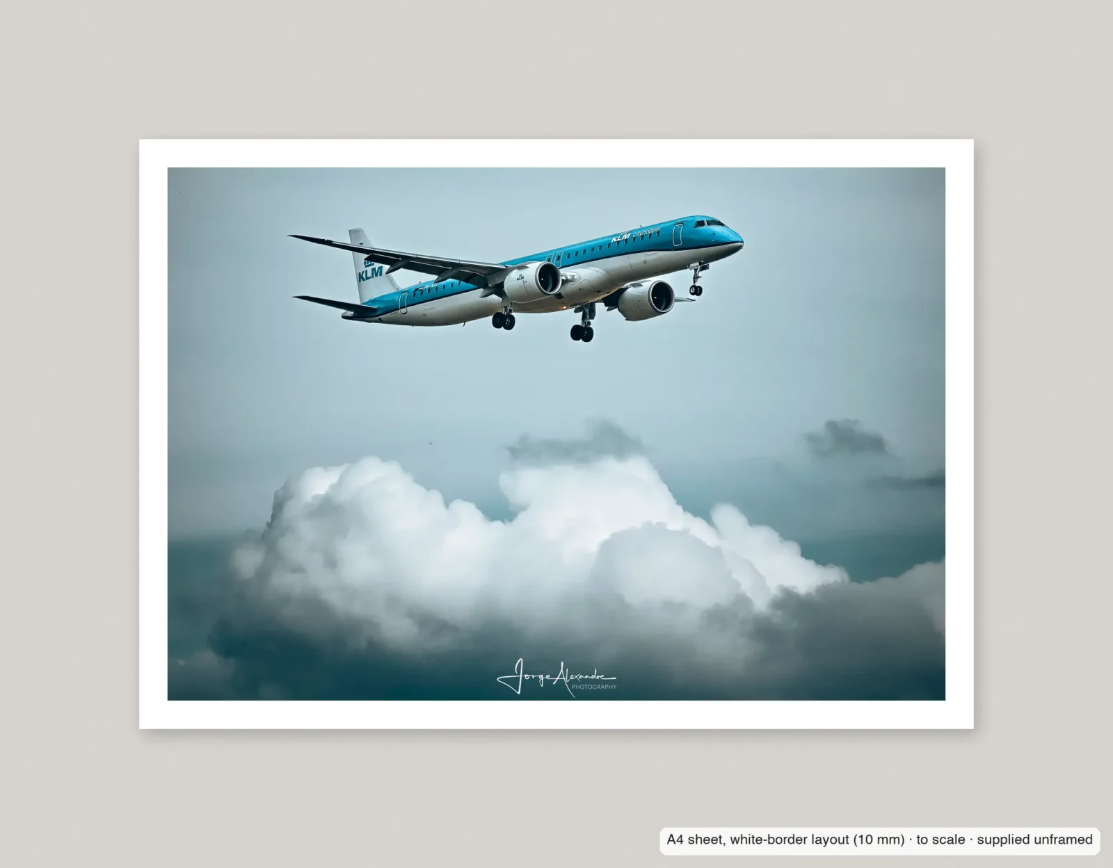 KLM over the cumulus printed as an A4 sheet with a 10 mm white border, shown flat and unframed.