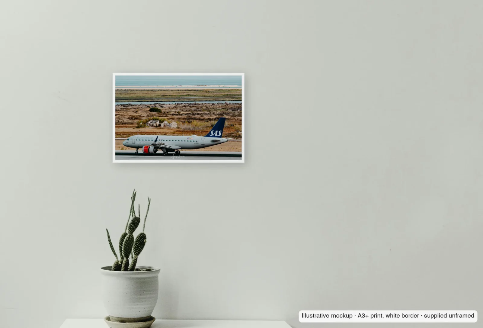 Closer view of North meets south as an unframed A3+ white-border print above a sideboard.