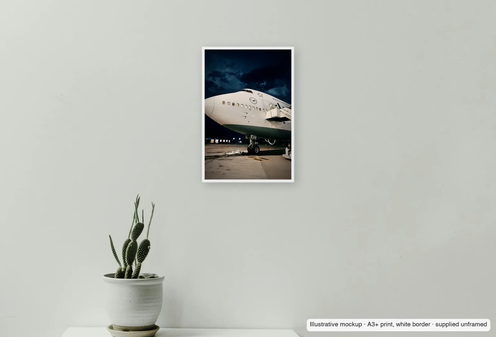 Closer view of Queen of the night as an unframed A3+ white-border print above a sideboard.