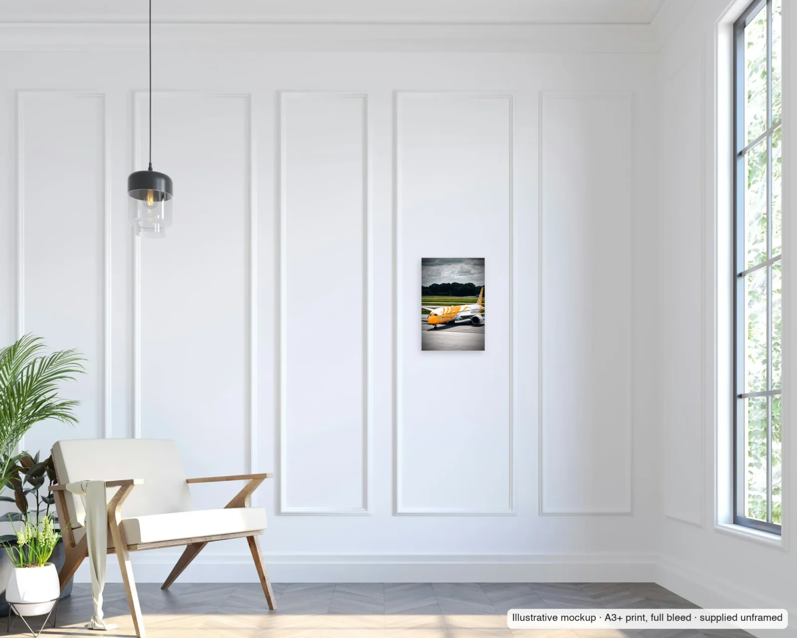 Illustrative mockup of Scoot under a heavy sky as an unframed A3+ full-bleed print on a living-room wall.