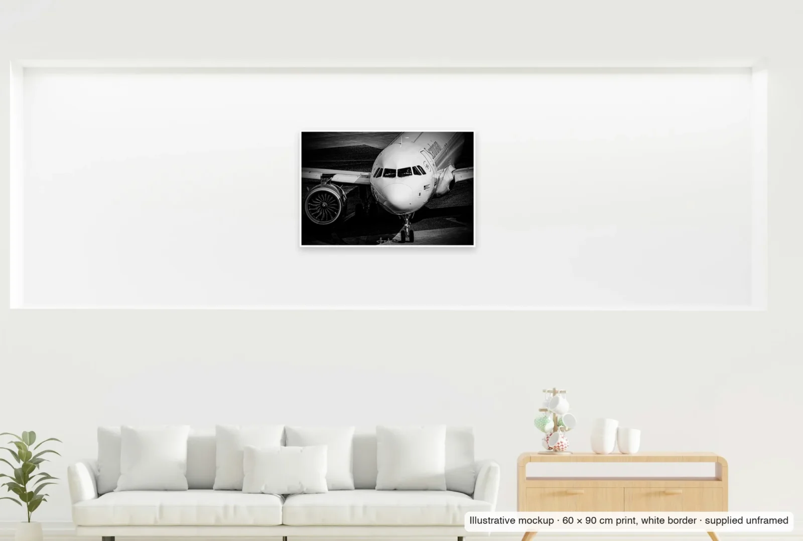 Illustrative mockup showing the scale of Silver and shadow as an unframed 60 × 90 cm print above a sofa.