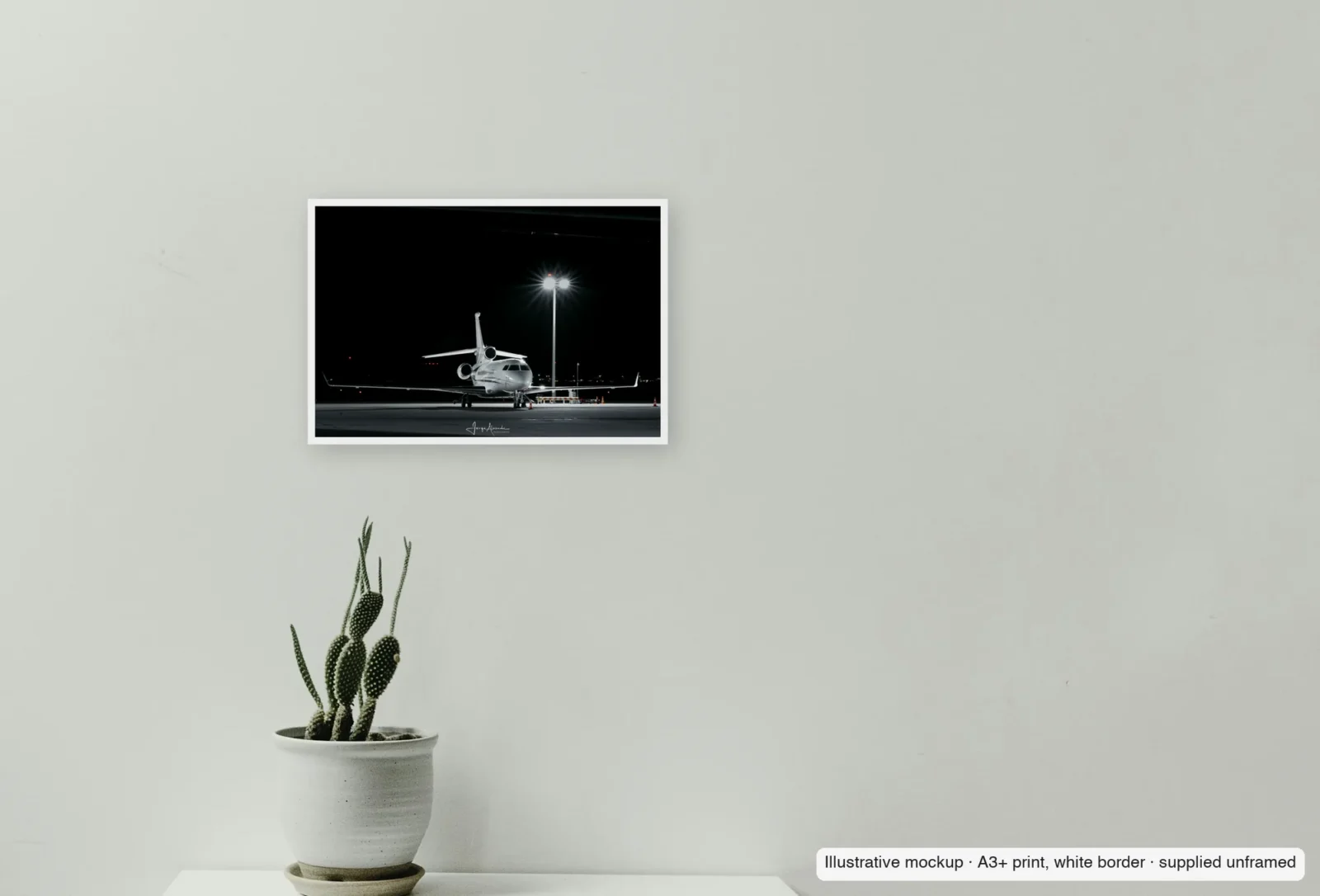 Closer view of Starburst stand as an unframed A3+ white-border print above a sideboard.