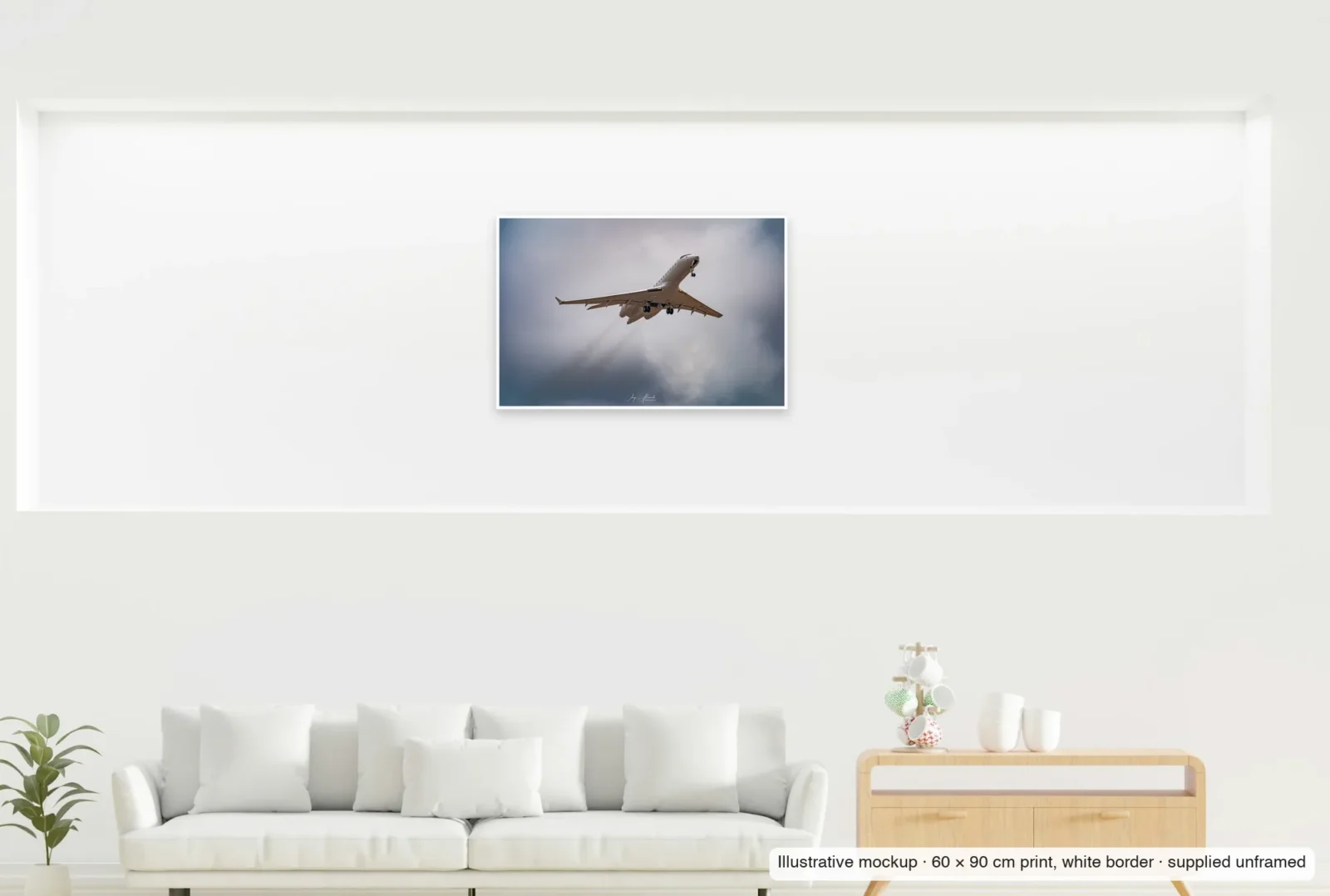 Illustrative mockup showing the scale of Vapour in the grey as an unframed 60 × 90 cm print above a sofa.